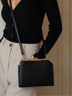 Classic Black Crossbody Bag with Gold Frame